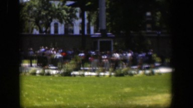 1951: tall statue with many visitors to look upon. WYOMING