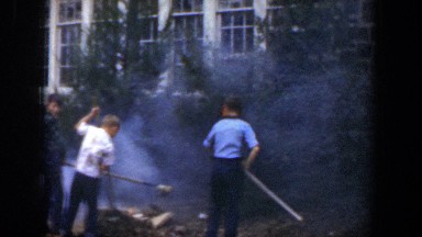 1951: Three Children Working Outside a Brick Building Cuba