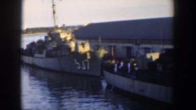 1951: Two Boats Parked in Line Next to a Building Cuba