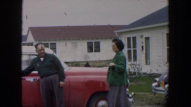 1951: man and woman wave before and after entering car through passenger door