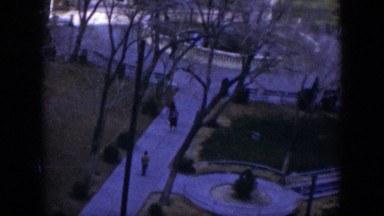 1951: people walking around a concrete sidewalk in the winter TEXAS