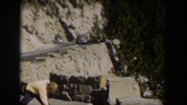 1951: white snow covering the side of a rock mountain WYOMING