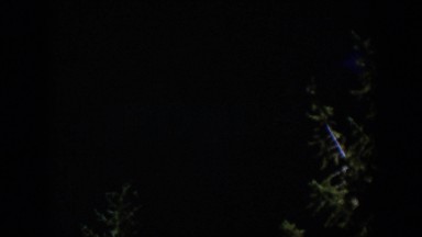 1951: a waterfall as viewed at night from inside a limestone cave
