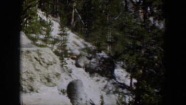 1951: snow covered bank all alone. WYOMING