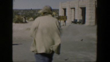 1951: random people walking in high amounts of wind. TEXAS