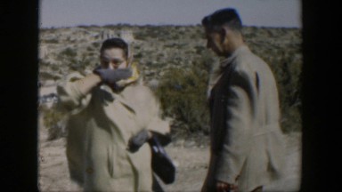 1951: a middle age couple enjoy greece's vacation spot and the wife hams it up