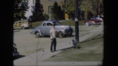 1954: a man walking up a sidewalk to a building NEVADA