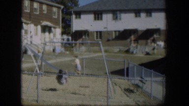 1954: three children play on the playground NEVADA