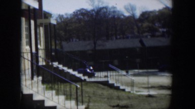 1954: residential area has connected homes, staircases to front doors and street