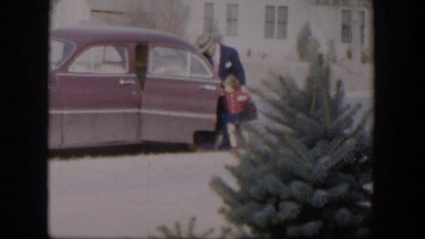 1954: a father brings a dish to neighbor's house with his daughter NEVADA