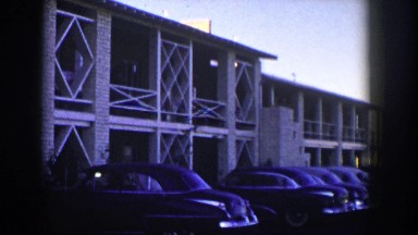 1954: ten classic cars all parked facing the same direction