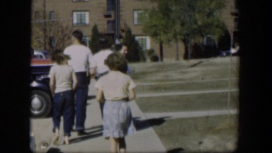 1954: family walking on a sidewalk together. NEVADA