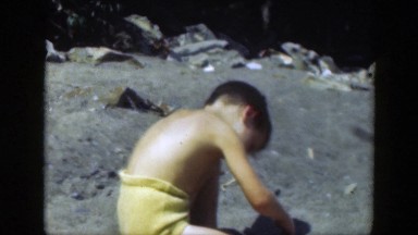 1947: Boy Playing in the Sand at Connecticut Beach