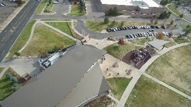 an aerial view of a multi story complex on a sunny day COLORADO