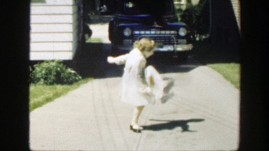 1949: girl playing with a ball MASSACHUSETTS
