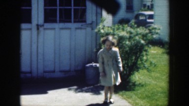 1949: little girl playing with a ball in the driveway! MASSACHUSETTS