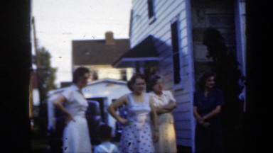 1949: family gathers in back yard on summer day MASSACHUSETTS