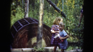 1948: little boy and girl eating crackers outside. WASHINGTON DC