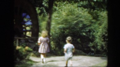 1948: a little girl and her little brother standing by a mill WASHINGTON DC