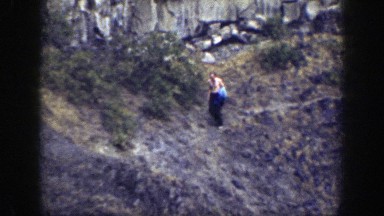 1937: Topless Man Descending Hilly Area California