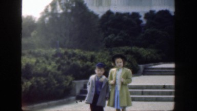 1949: Party of Kids Walking Down Sidewalk in Cincinnati Ohio