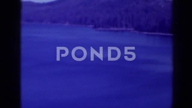 1938: Motorboat Traveling Down the Lake at High Speed in Washington