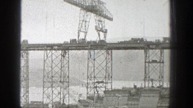 1938: industrial view of buildings and a random car driving. WASHINGTON