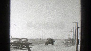 1939: a large truck hauling in feeding sacks. CALIFORNIA