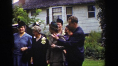 1939: people gathered outside building posing and talking WYOMING