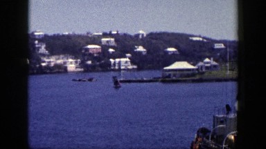 1948: A Still Tugboat Sits Docked on a Sunny Day in New York