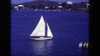 1948: A Sailboat Cruises Down a Very Blue Lake New York