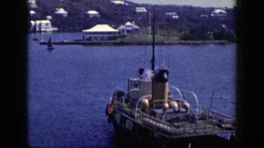 1948: A Small Vessel Lying in Blue Waters Near the Shore, New York