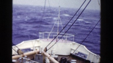 1948: Big White Boat on Blue Open Sea with Clear Horizon View Ahead