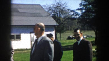 1957: adults leaving a funeral. MICHIGAN