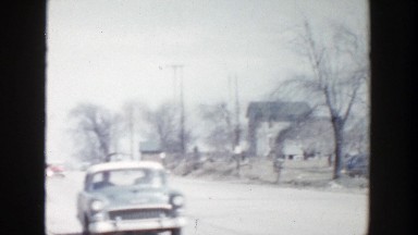 1956: viewing of a rural town with traffic on the side. GRAND RAPIDS MICHIGAN