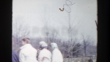 1956: a family get-together in the front yard on a snowy day GRAND RAPIDS