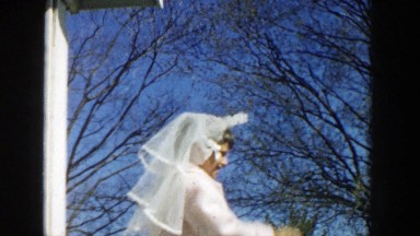 1957: two young kids are celebrating a special day with white clothes MICHIGAN