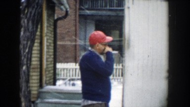 1957: a family getting ready for the christmas trip in a cold winter day