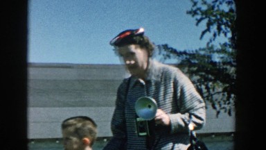 1957: Photographer mother and son