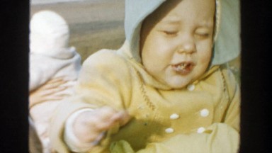 1958: cute adorable baby being held in the arms of her mother MICHIGAN