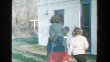 1958: family playing outside in the cold weather MICHIGAN