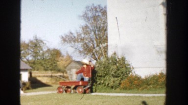 1958: a child pulling another child in a wagon MICHIGAN