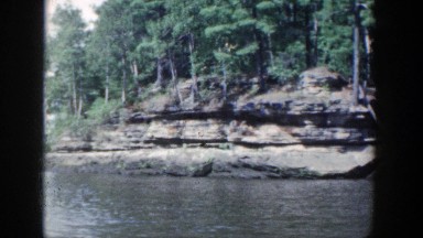 1964: boat driving down river WISCONSIN