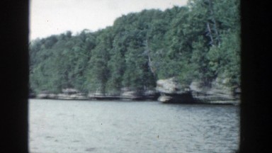 1964: water scene trees alongside beautiful scene WISCONSIN