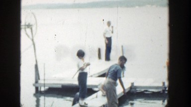 1964: dad, sister and brother enjoying the afternoon, close to water