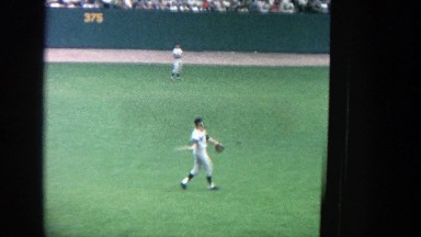 1964: Baseball Player Throwing Ball on Green Grass Field at Yankee Stadium