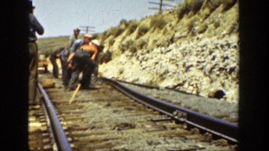 1936: a group of workers displacing the rail track CALIFORNIA