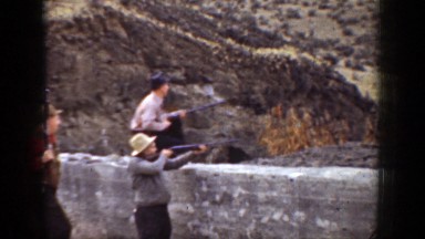 1936: boys shooting guns CALIFORNIA