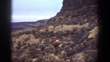 1936: random people hiking in a far away desert. CALIFORNIA