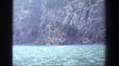 1939: enjoying a lovely afternoon sailing in a boat. CHELAN WASHINGTON